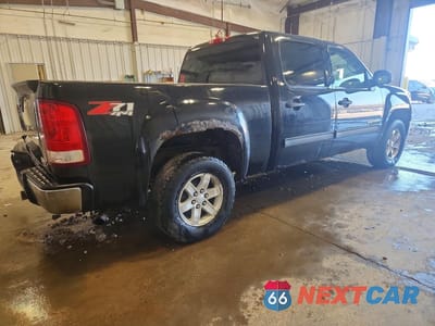 Trzecie zdjęcie samochodu z tyłu: 2011 GMC SIERRA K1500 SLE VIN:3GTP2VE38BG112424 - miniatura