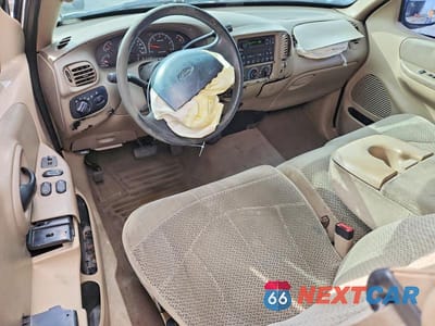 Zdjęcie 8 z 13 samochodu: 2000 FORD F150 VIN:1FTRX18L5YKA03421 - miniatura