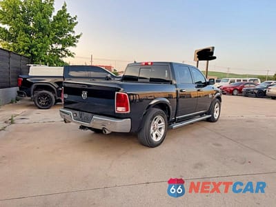 Czwarte zdjęcie samochodu z boku: 2016 RAM 1500 LONGHORN VIN:1C6RR6PT4GS194635 - miniatura