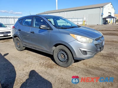 Czwarte zdjęcie samochodu z boku: 2010 HYUNDAI TUCSON GLS VIN:KM8JT3AC0AU018817 - miniatura