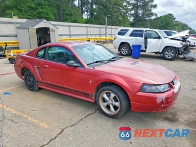 Czwarte zdjęcie samochodu z boku: 2002 FORD MUSTANG VIN:1FAFP40462F102084 - miniatura