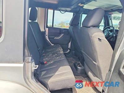 Zdjęcie 10 z 12 samochodu: 2017 JEEP WRANGLER UNLIMITED SPORT VIN:1C4HJWDG3HL670971 - miniatura