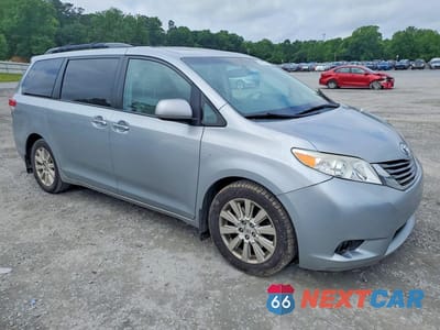 Czwarte zdjęcie samochodu z boku: 2014 TOYOTA SIENNA XLE 7-PASSENGER VIN:5TDDK3DC5ES082281 - miniatura
