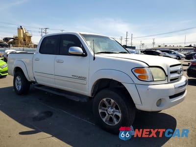 Czwarte zdjęcie samochodu z boku: 2004 TOYOTA TUNDRA DOUBLE CAB SR5 VIN:5TBET34144S447881 - miniatura