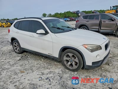 Czwarte zdjęcie samochodu z boku: 2014 BMW X1 VIN:WBAVM1C54EVW52053 - miniatura