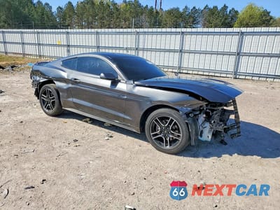 Czwarte zdjęcie samochodu z boku: 2018 FORD MUSTANG VIN:1FA6P8TH2J5165290 - miniatura