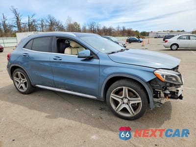 Czwarte zdjęcie samochodu z boku: 2015 MERCEDES-BENZ GLA 250 4MATIC VIN:WDCTG4GB6FJ074902 - miniatura