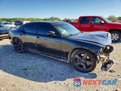Czwarte zdjęcie samochodu z boku: 2007 DODGE CHARGER SRT-8 VIN:2B3LA73W27H725643 - miniatura