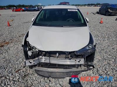 Piąte zdjęcie samochodu w środku: 2021 TOYOTA PRIUS L ECO VIN:JTDKAMFU8M3146996 - miniatura