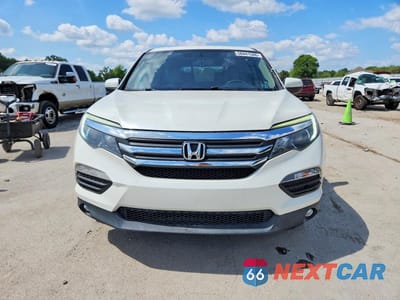 Piąte zdjęcie samochodu w środku: 2017 HONDA PILOT EXL VIN:5FNYF5H54HB040089 - miniatura