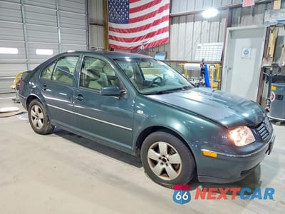 Czwarte zdjęcie samochodu z boku: 2005 VOLKSWAGEN JETTA GLS VIN:3VWSK69M05M015434 - miniatura