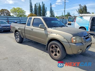 Czwarte zdjęcie samochodu z boku: 2001 NISSAN FRONTIER SC VIN:1N6MD26Y31C356647 - miniatura