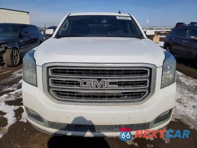 Piąte zdjęcie samochodu w środku: 2015 GMC YUKON SLT VIN:1GKS2BKC9FR108759 - miniatura