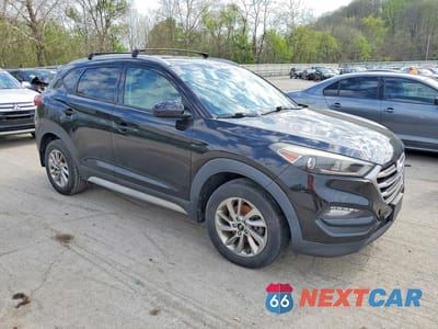 Czwarte zdjęcie samochodu z boku: 2017 HYUNDAI TUCSON SE VIN:KM8J33A47HU466992 - miniatura