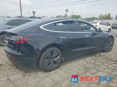 Trzecie zdjęcie samochodu z tyłu: 2018 TESLA MODEL 3 VIN:5YJ3E1EB0JF068073 - miniatura