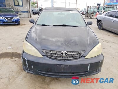 Piąte zdjęcie samochodu w środku: 2004 TOYOTA CAMRY LE VIN:4T1BE32K94U323144 - miniatura