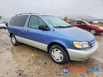 Czwarte zdjęcie samochodu z boku: 1999 TOYOTA SIENNA XLE VIN:4T3ZF13C6XU163890 - miniatura