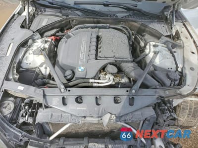 Zdjęcie 11 z 13 samochodu: 2014 BMW 740 I VIN:WBAYA6C50ED144154 - miniatura