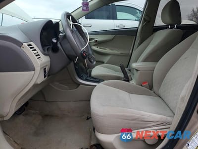 Zdjęcie 7 z 11 samochodu: 2009 TOYOTA COROLLA BASE VIN:2T1BU40E69C184542 - miniatura