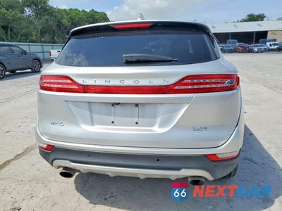 Zdjęcie 6 z 12 samochodu: 2017 LINCOLN MKC PREMIERE VIN:5LMCJ1C96HUL33844 - miniatura