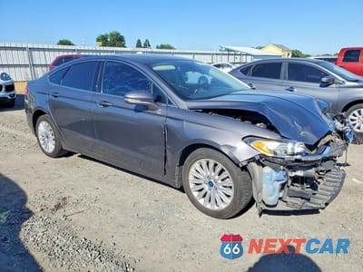 Czwarte zdjęcie samochodu z boku: 2013 FORD FUSION SE HYBRID VIN:3FA6P0LU5DR261009 - miniatura