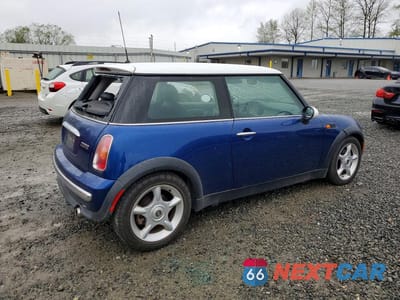 Trzecie zdjęcie samochodu z tyłu: 2002 MINI COOPER VIN:WMWRC33462TC32585 - miniatura