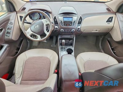 Zdjęcie 8 z 12 samochodu: 2012 HYUNDAI TUCSON GLS VIN:KM8JU3AC9CU422585 - miniatura