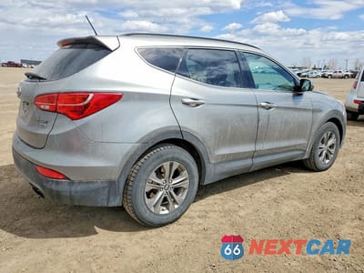 Trzecie zdjęcie samochodu z tyłu: 2015 HYUNDAI SANTA FE SPORT 2.0T VIN:5XYZUDLA2FG288680 - miniatura