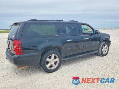 Trzecie zdjęcie samochodu z tyłu: 2007 CHEVROLET SUBURBAN K1500 VIN:1GNFK16Y17R365159 - miniatura