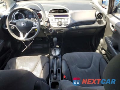 Zdjęcie 8 z 13 samochodu: 2009 HONDA FIT VIN:JHMGE88439S015789 - miniatura
