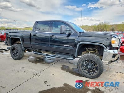 Czwarte zdjęcie samochodu z boku: 2015 GMC SIERRA K2500 SLE VIN:1GT12YE81FF129625 - miniatura