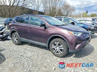Czwarte zdjęcie samochodu z boku: 2018 TOYOTA RAV4 LE VIN:2T3BFREV1JW769345 - miniatura