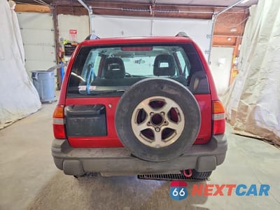 Zdjęcie 6 z 13 samochodu: 2003 CHEVROLET TRACKER VIN:2CNBJ734636938525 - miniatura