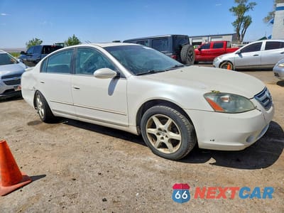 Czwarte zdjęcie samochodu z boku: 2003 NISSAN ALTIMA SE VIN:1N4BL11D03C275870 - miniatura