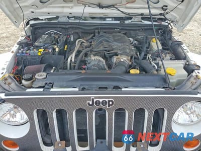 Zdjęcie 11 z 12 samochodu: 2012 JEEP WRANGLER UNLIMITED SAHARA VIN:1C4BJWEG3CL277680 - miniatura