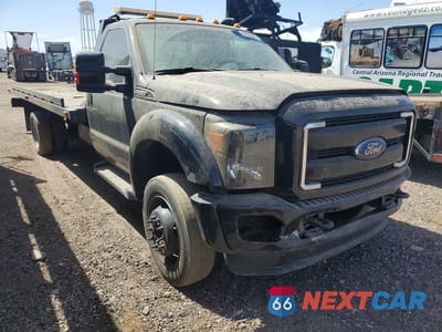 Czwarte zdjęcie samochodu z boku: 2014 FORD F550 SUPER DUTY VIN:1FDUF5GY9EEB37548 - miniatura