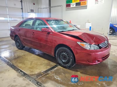 Czwarte zdjęcie samochodu z boku: 2003 TOYOTA CAMRY LE VIN:4T1BE30K33U143594 - miniatura