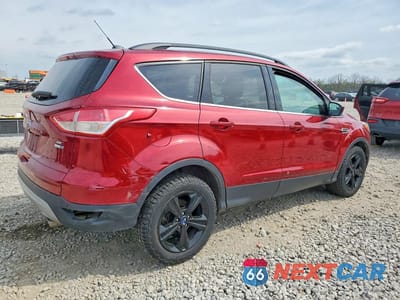 Trzecie zdjęcie samochodu z tyłu: 2016 FORD ESCAPE SE VIN:1FMCU9GX5GUA73873 - miniatura