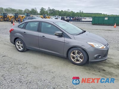 Czwarte zdjęcie samochodu z boku: 2014 FORD FOCUS SE VIN:1FADP3F20EL438083 - miniatura