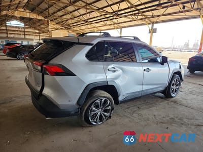 Trzecie zdjęcie samochodu z tyłu: 2023 TOYOTA RAV4 XLE PREMIUM VIN:4T3B6RFV0PU138612 - miniatura