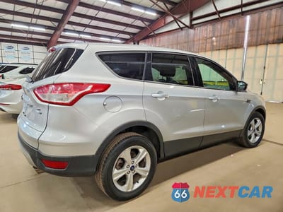 Trzecie zdjęcie samochodu z tyłu: 2014 FORD ESCAPE SE VIN:1FMCU9GX5EUB57754 - miniatura