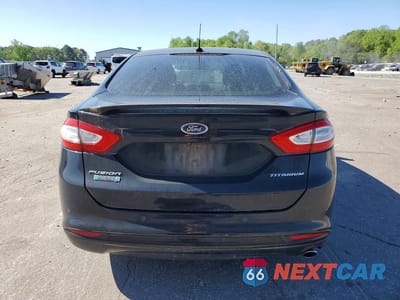 Zdjęcie 6 z 11 samochodu: 2013 FORD FUSION TITANIUM PHEV VIN:3FA6P0SU3DR332144 - miniatura