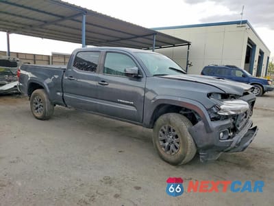 Czwarte zdjęcie samochodu z boku: 2023 TOYOTA TACOMA SR5 V6 VIN:3TMBZ5DN3PM038606 - miniatura