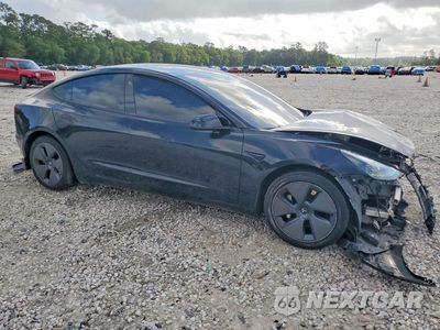 Czwarte zdjęcie samochodu z boku: 2023 TESLA MODEL 3 VIN:5YJ3E1EA4PF426162 - miniatura