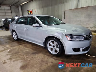 Czwarte zdjęcie samochodu z boku: 2015 VOLKSWAGEN PASSAT SE VIN:1VWBV7A34FC058869 - miniatura