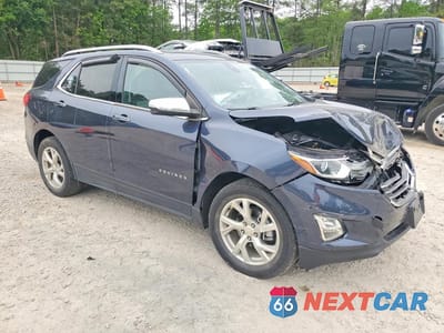 Czwarte zdjęcie samochodu z boku: 2018 CHEVROLET EQUINOX PREMIER VIN:3GNAXVEV7JL404149 - miniatura