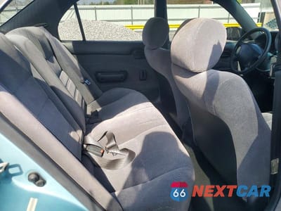 Zdjęcie 10 z 12 samochodu: 1994 TOYOTA COROLLA DX VIN:1NXAE09B1RZ183033 - miniatura