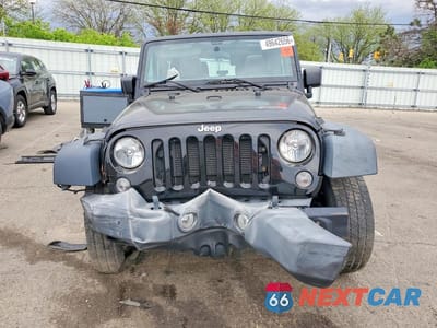 Piąte zdjęcie samochodu w środku: 2018 JEEP WRANGLER SPORT VIN:1C4GJWAG8JL928830 - miniatura