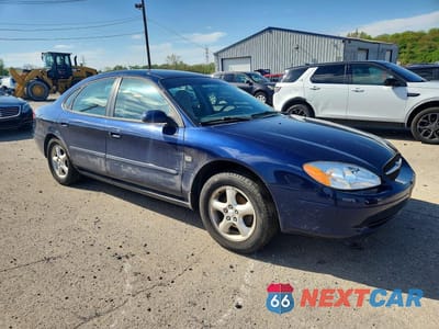 Czwarte zdjęcie samochodu z boku: 2000 FORD TAURUS SES VIN:1FAFP55S8YG205166 - miniatura