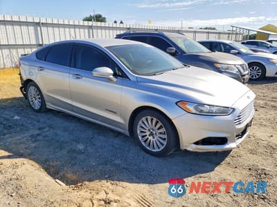 Czwarte zdjęcie samochodu z boku: 2016 FORD FUSION SE HYBRID VIN:3FA6P0LU2GR157212 - miniatura